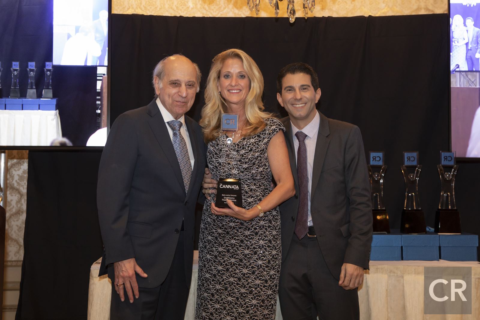 Jennie Fisher poses with Frank and CJ Cannata